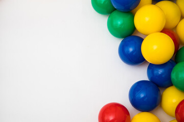 Multi-colored plastic balls. A children's balls isolated on white background.