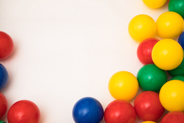 Obraz premium Multi-colored plastic balls. A children's balls isolated on white background.