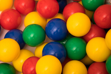 Fototapeta na wymiar Multi-colored plastic balls. A children's balls isolated on white background.