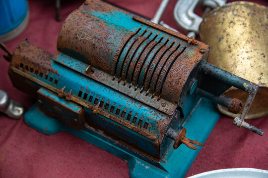 Old vintage mechanical rusty blue calculator