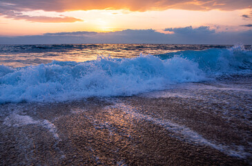 Beautiful sunset on the sea sandy beach