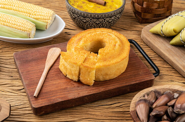 Typical brazilian june festival food over wooden table. Festa junina