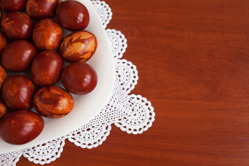 Easter time. Traditional handmade Easter eggs on table. Copy space