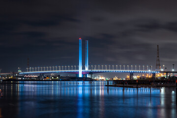 Bolte Bridge illuminated in blue at night time, Melbourne, Australia.