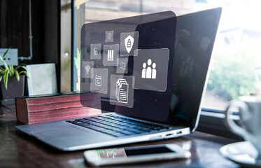 ERP (Enterprise Resource Planning) document management concept,  with icons on virtual screens.