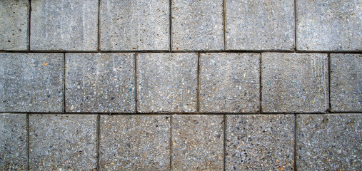Black and white brick wall background. Detail of a Black and white brick wall texture.