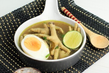 Indonesian Traditional Food Named Soto Ceker Ayam (Chicken Soup with Chicken Leg)