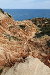 Badlands and landslides-red sands-contour of Praia da Marinha Beach. Lagoa-Portugal-195