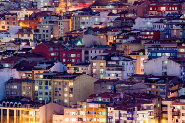Residential buildings in Istanbul. Urban sprawl. Aerial view of Istanbul City in Turkey. Evening view of the city 