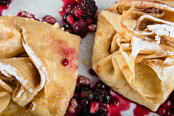 pancakes with walnuts and forest fruits