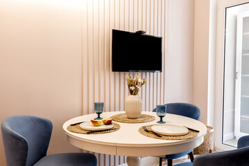 Photo of the decorated living room kitchen in the apartment