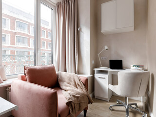 Photo of a cozy loggia with a workplace