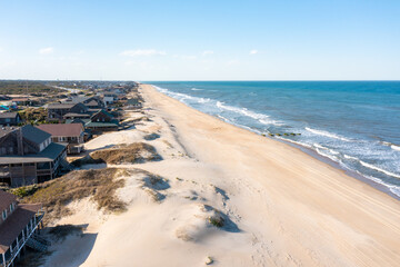 Aerial view of beach homes in Nags head looking North towards the Nags Head fishing Pier