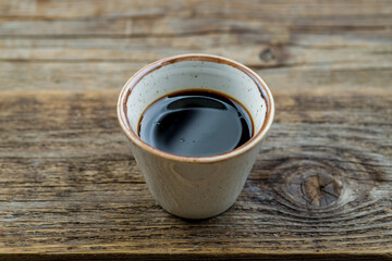 narsharab sauce in a saucepan on old wooden table