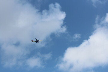 Plane in  the sky taken from below