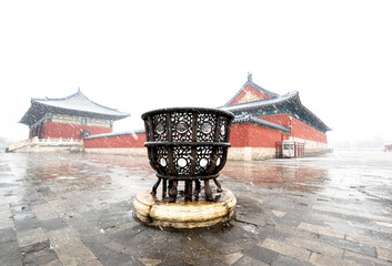 Ancient building in Temple of Heaven in the snow
