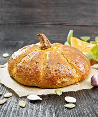 Bread pumpkin on a wooden board