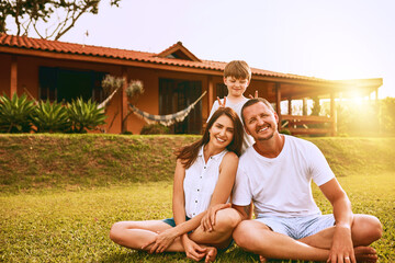 Family, the most beautiful reason to smile. Cropped shot of a young family spending time together...