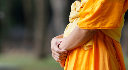 Close up of Buddhist Thai monk meditation with inner peace that lead to enlighten wisdom and life...