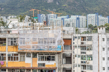 Old crowded apartments exterior in Hong Kong