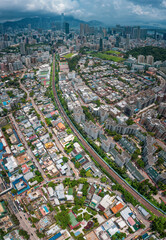 Naklejka premium Aerial view of a railway in downtown urban area, Hong Kong
