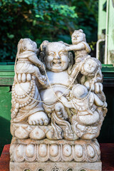 Old Stone Sculpture of god in temple, Hong Kong, Asia