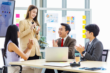 Asian young pretty professional successful businesswoman staff standing greeting say thank you when...