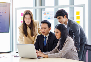 Group of millennial Asian young happy professional successful male and female businessman...