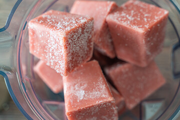 Homemade organic fresh smoothie cubes on kitchen counter