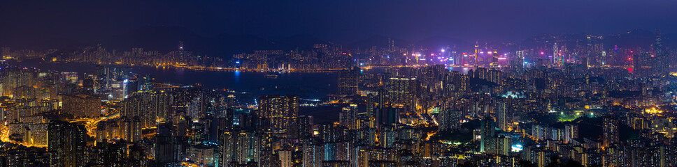 Fototapeta premium panorama view of Night of Kowloon, residential and downtown area, Hong Kong