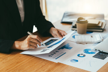 Businesswoman hands hold documents with financial statistic stock photo,discussion and analysis...