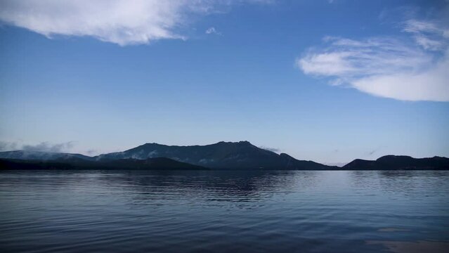 The water surface of the lake after the rain. Calm on the lake. Kazakhstan, Borovoye (Kokshetau).