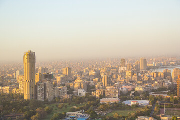 Fototapeta na wymiar CAIRO, EGYPT - DECEMBER 29, 2021: Beautiful view of the center of Cairo and Zamalek island from the Cairo Tower in Cairo, Egypt