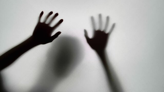 Abstract And Spooky Defocused Hand In Slow Motion
