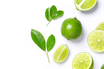 limes with slice and leaves