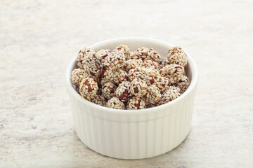 Sweet peanut in sesame seeds