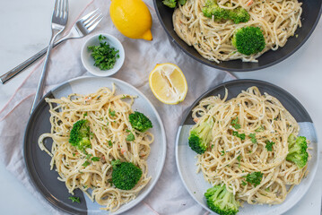 lemon spaghetti with green broccoli on a table