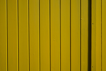 Wooden vertical texture yellow rustic plank in wood background