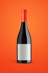 A bottle of red wine isolated on a orange background for mockup presentation projects.