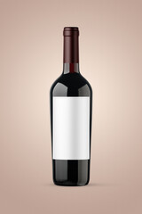 A bottle of red wine isolated on a brown background for mockup presentation projects.