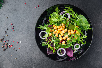 chickpea salad green leaf lettuce mix fresh healthy meal food diet snack on the table copy space food background keto or paleo diet veggie vegan or vegetarian food