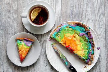Fototapeta na wymiar Breakfast with pie. Colorful cake. Cup with tea