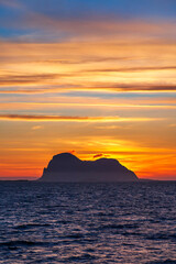 Rock formation at sea with an amazing sunset