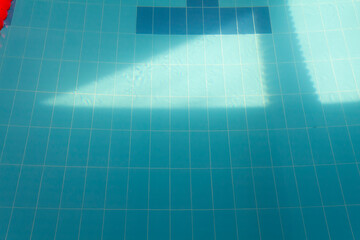 The light of the Rembrandt Triangle in the pool with clear water in the hotel.