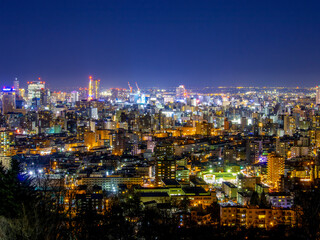Fototapeta na wymiar Night view of Sapporo, Hokkaido, Japan. Japan's new top three night views. 日本新三大夜景都市 札幌の夜景 旭山記念公園 その1