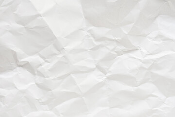 White crumpled paper texture background.