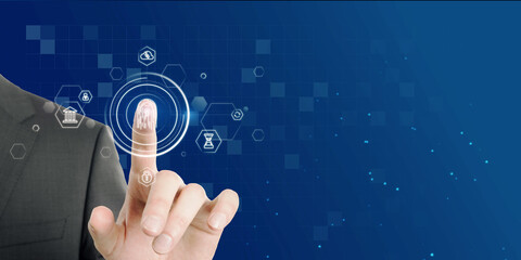 Close up of businessman hand pointing at abstract glowing id fingerprint web protection and security interface on blurry blue bokeh background with mock up place.