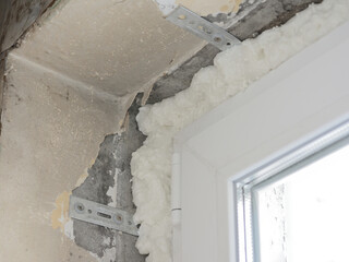 Installation and insulation of the window with the help of mounting foam. Into the old window opening