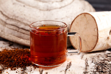 Chaga tea - Healthy natural drink. Strong antioxidant. Prepared from dried birch mushroom. Rustic...