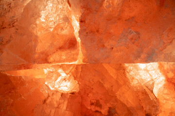 Himalayan salt surface. Natural crystal pink salt background. Mineral sea salt crystal for cooking,...